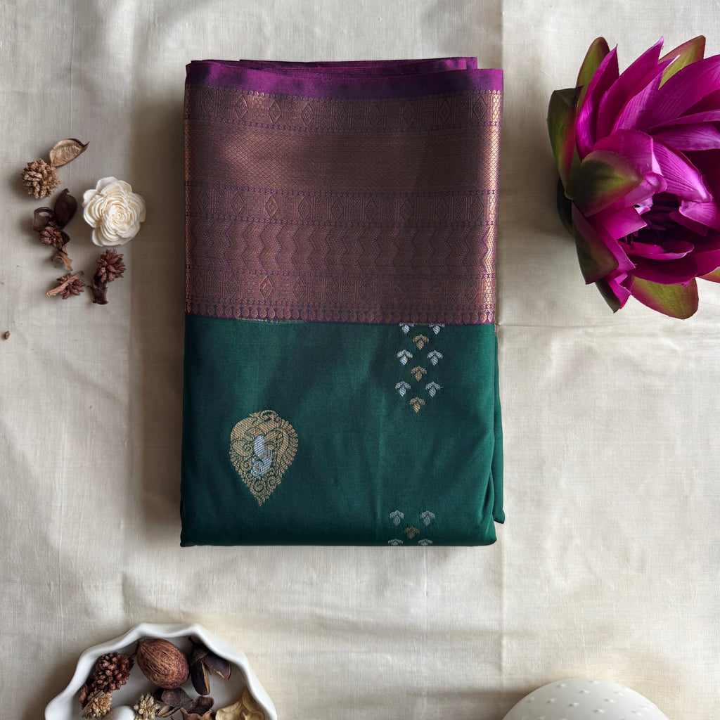 Mrinalini — Bottle Green Handloom Kanchipuram Silk Saree with Peacock Buttas & Purple Zari Border | THRIVYA