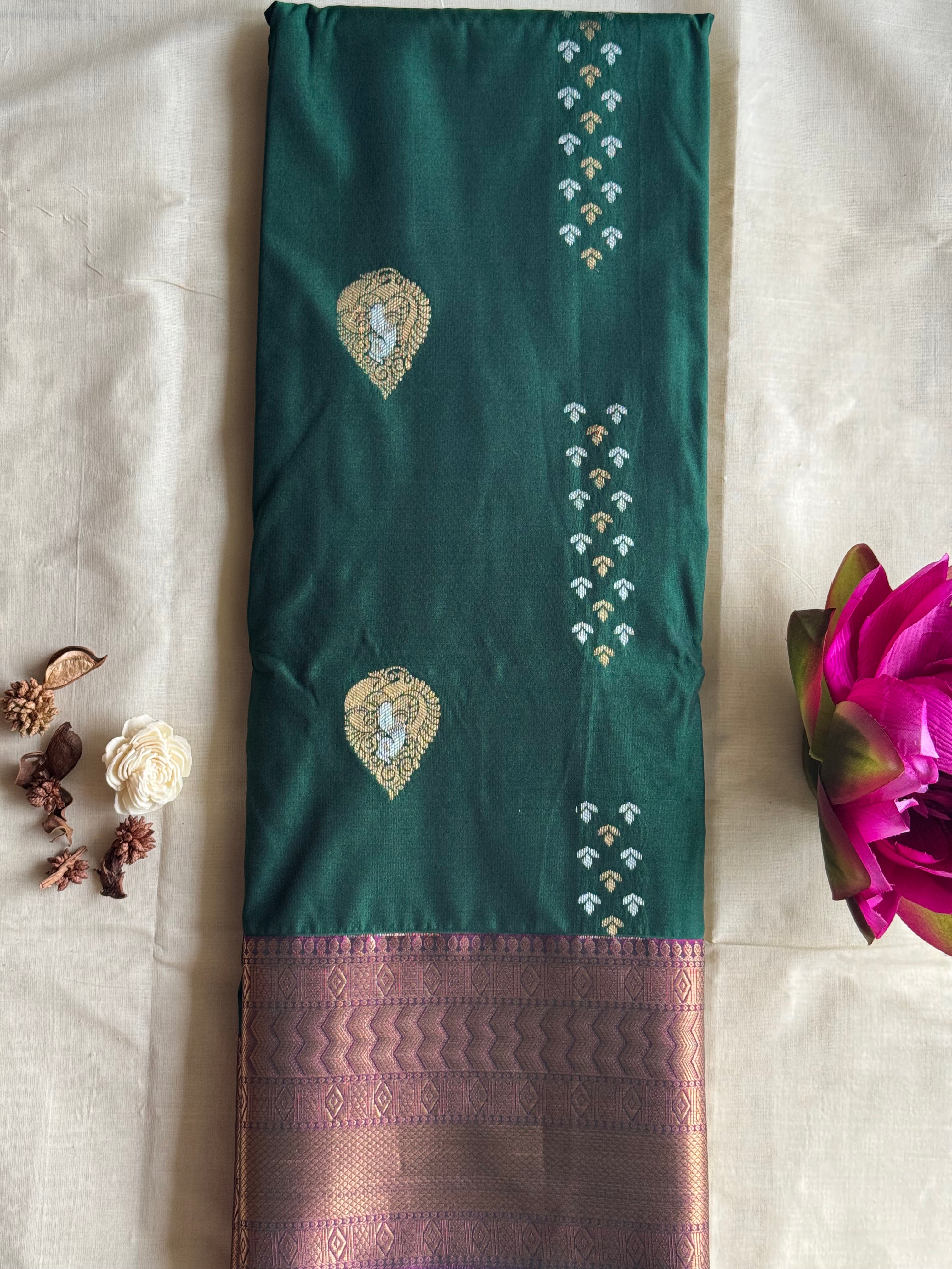 Mrinalini — Bottle Green Handloom Kanchipuram Silk Saree with Peacock Buttas & Purple Zari Border | THRIVYA