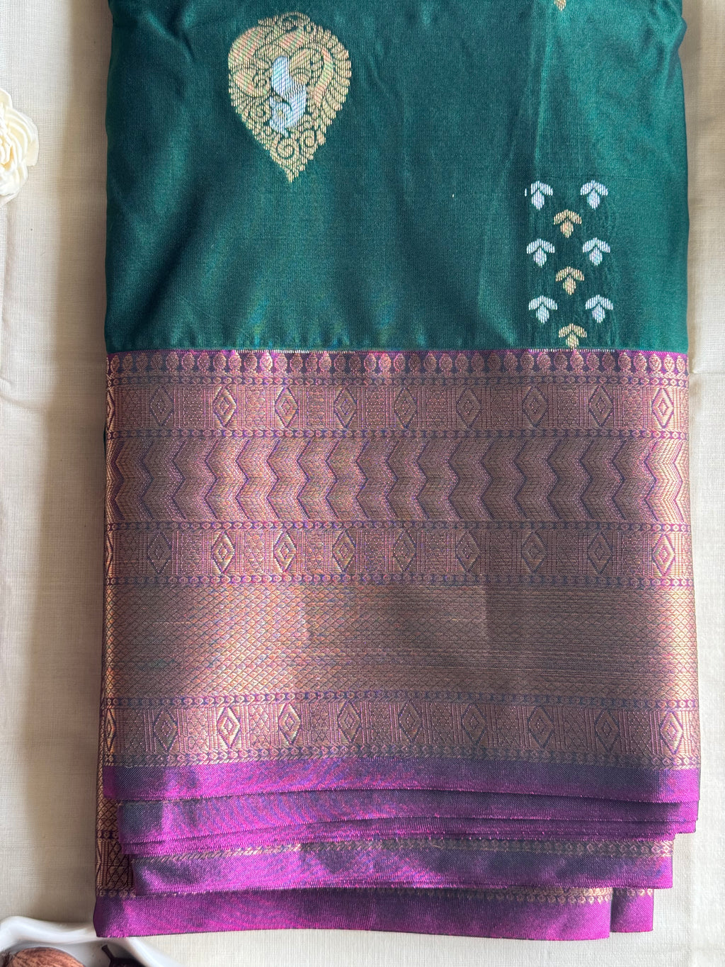 Mrinalini — Bottle Green Handloom Kanchipuram Silk Saree with Peacock Buttas & Purple Zari Border | THRIVYA